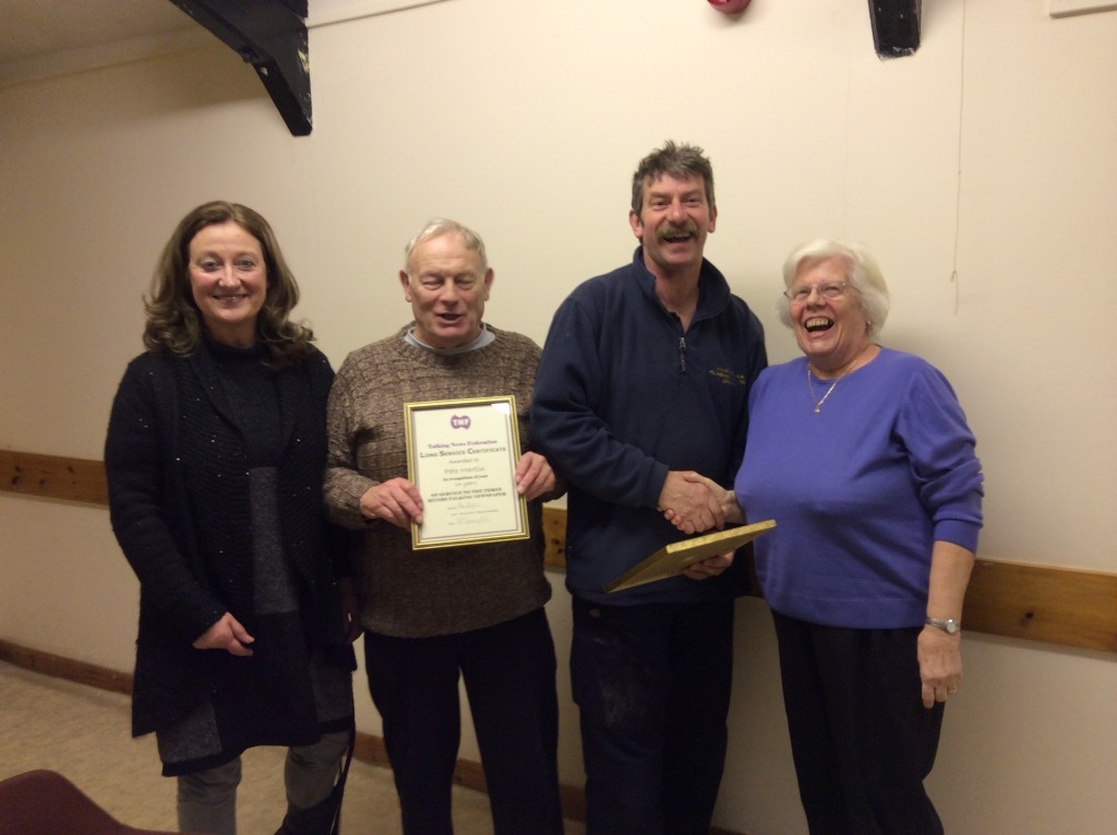 Certificate presentation to Peter and Pam Martin