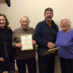 Photogrph of Peter and Pam Martin Receiving Certificates.
